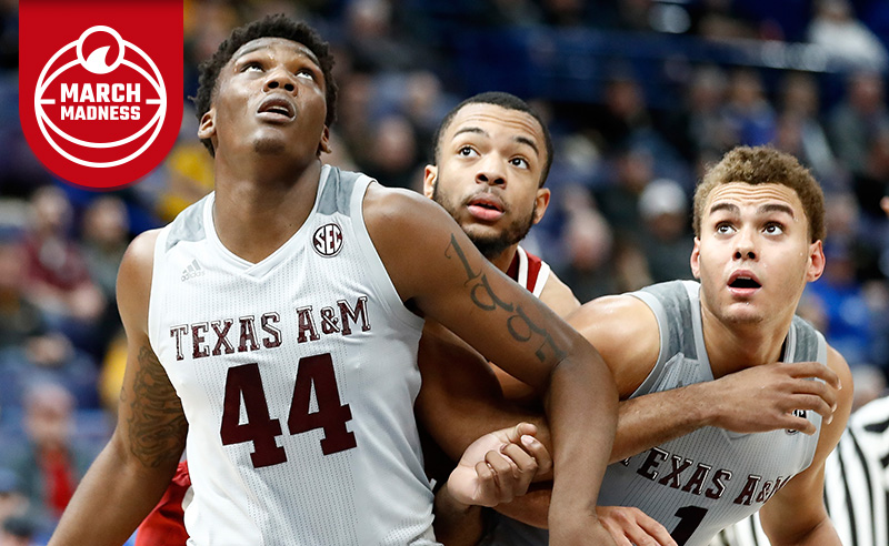 Robert Williams of the Texas A&M Aggies boxes out for a rebound against the Alabama Crimson Tide during the second round of the 2018 SEC Basketball Tournament 