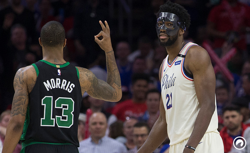 Marcus Morris #13 of the Boston Celtics gestures to Joel Embiid #21 of the Philadelphia 76ers in the third quarter during Game Four of the Eastern Conference Second Round of the 2018 NBA Playoffs at Wells Fargo Center on May 7, 2018 in Philadelphia, Pennsylvania.