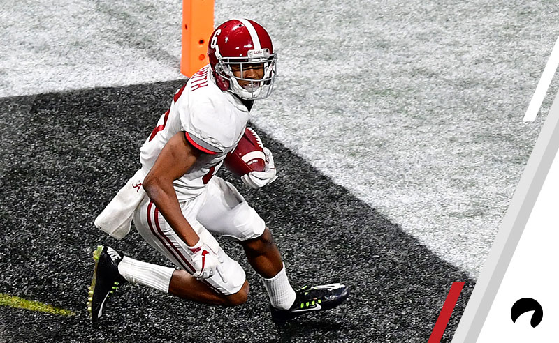 DeVonta Smith of the Alabama Crimson Tide makes the game-winning touchdown catch in overtime to defeat the Georgia Bulldogs in the CFP National Championship presented by AT&T at Mercedes-Benz Stadium on January 8, 2018 in Atlanta, Georgia. 