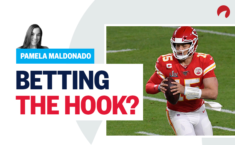 Patrick Mahomes playing getting ready to throw the football