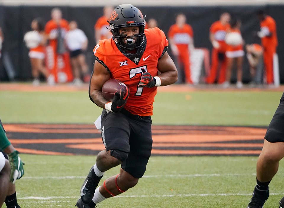 Jaylen Warren's Cowboys are underdogs in the Oklahoma State vs Iowa State odds.