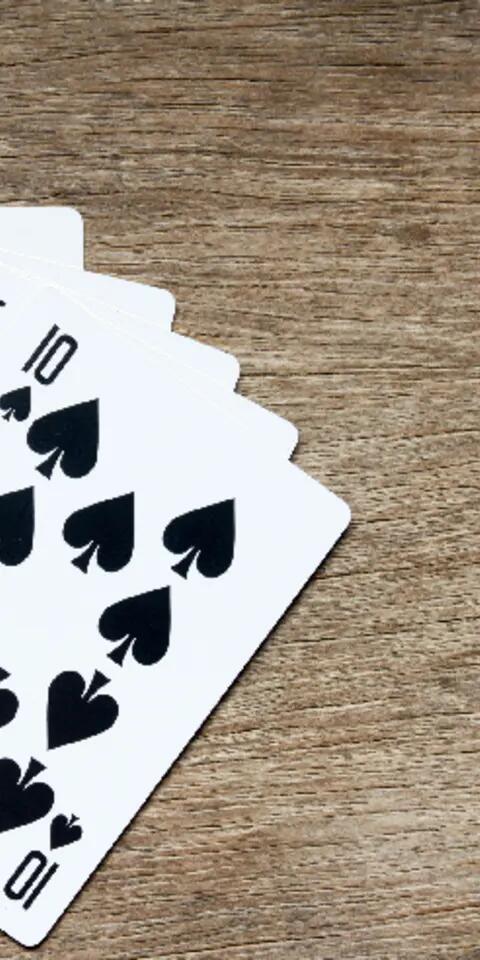five card draw poker straight flush on table