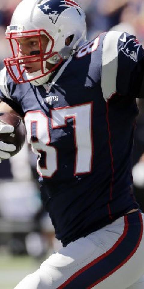 New England Patriots Tight End Rob Gronkowski running after the catch.
