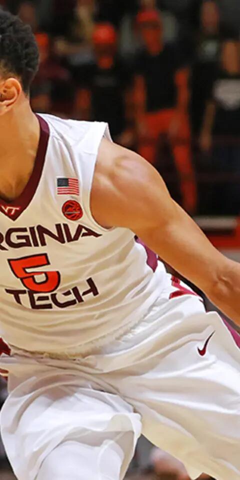  Justin Robinson of the Virginia Tech Hokies dribbles the ball against UNC.
