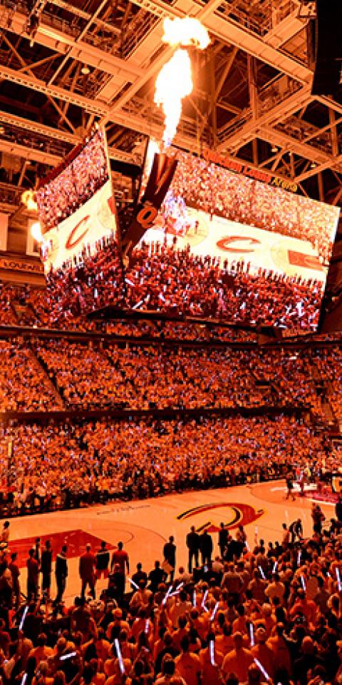 A general view of the crowd as fire erupts from the jumbotron during player introductions before Game Four of the Eastern Conference Finals of the 2015 NBA Playoffs against the Atlanta Hawks at Quicken Loans Arena on May 26, 2015 in Cleveland, Ohio.