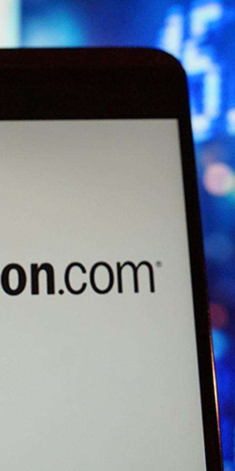 The logo of Amazon is seen in a smartphone.