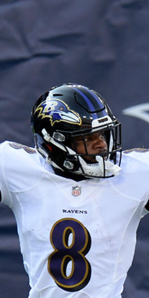 Lamar Jackson of the Baltimore Ravens celebrates after scoring a touchdown against the Tennessee Titans.