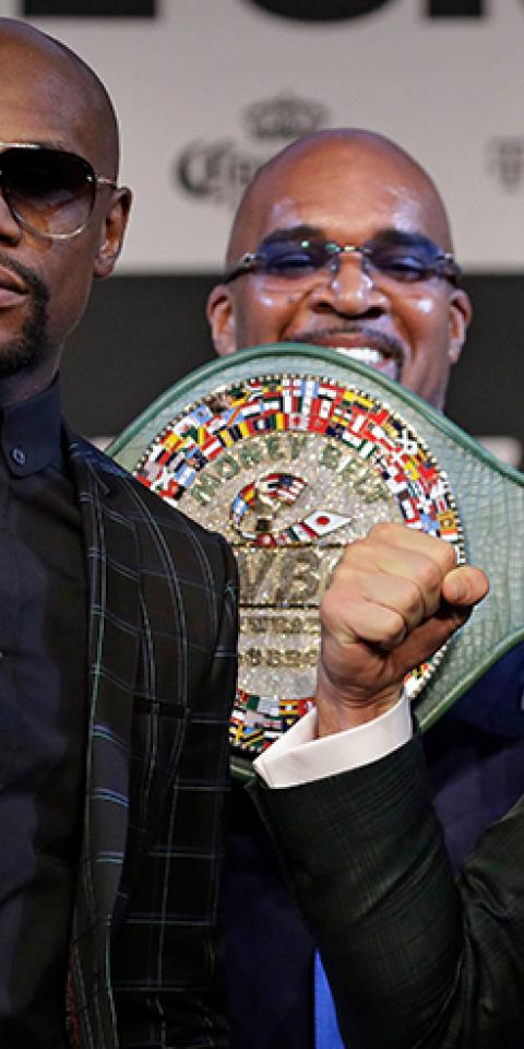 Floyd Mayweather (left) has the top top four most lucrative boxing matches.