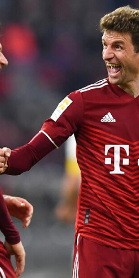 Thomas Müller celebra un gol. Conoce los pronósticos y cuotas del Villarreal Vs Bayern de la Champions League.