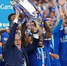 Leicester City team lifting EPL trophy marks one of the Biggest Upsets in Sports Betting History.