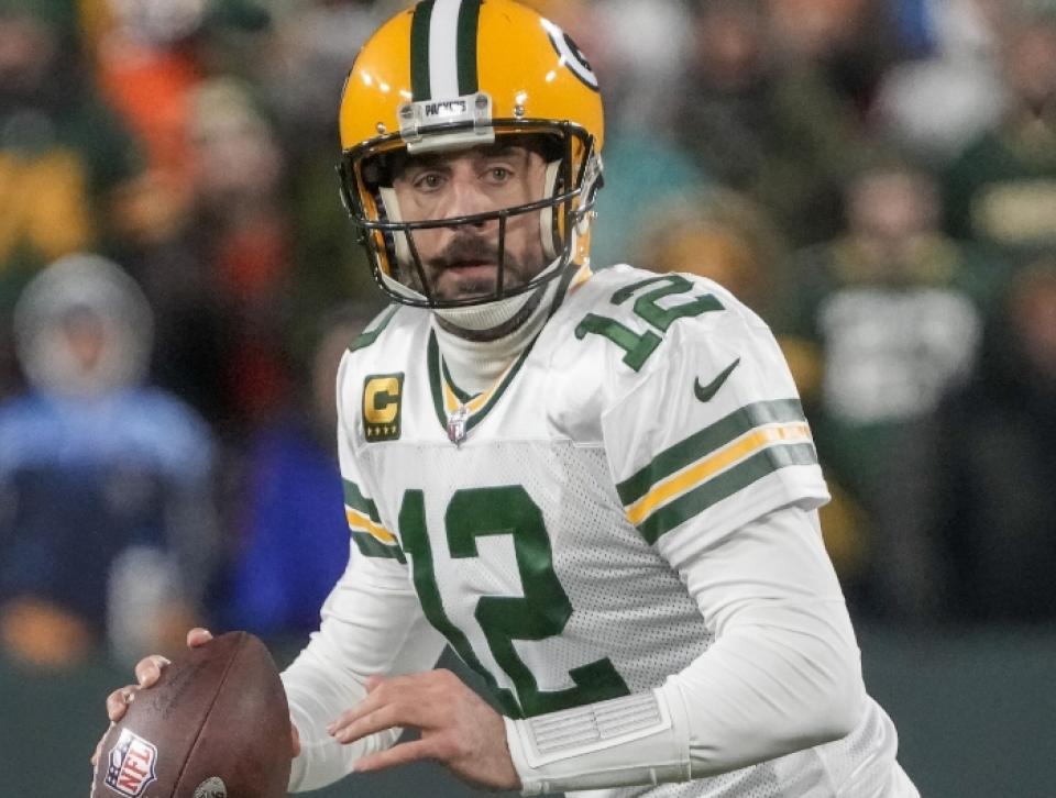Aaron Rodgers with a football in his hand