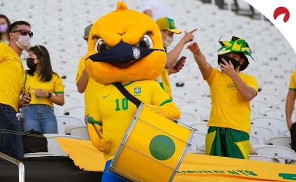 Calendário do Futebol Brasileiro 2022: Mascote Canarinho na torcida de Brasil x Argentina nas Eliminatórias da Copa do Mundo